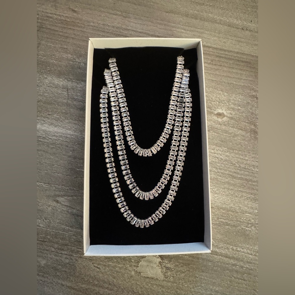 Akira three-layered rhinestone necklace with lobster clasp, silver metallic base